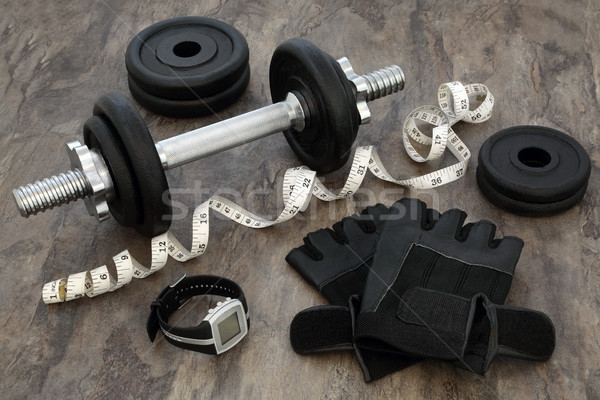 Súlyzós edzés felszerlés test építők súlyzó súlyok Stock fotó © marilyna