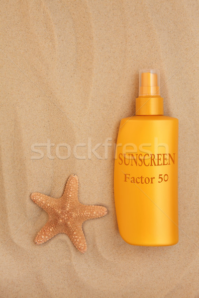 Fator cinqüenta protetor solar garrafa starfish concha Foto stock © marilyna
