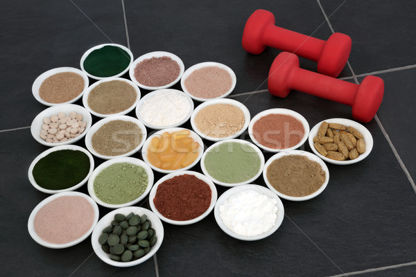 Body Building Powders and Vitamin Pills Stock photo © marilyna