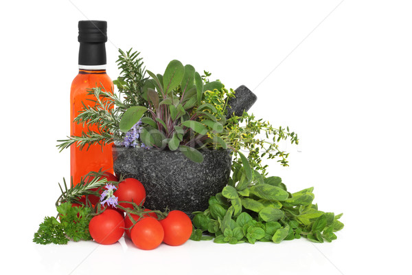 Chilli Oil, Herb Leaves and Tomatoes Stock photo © marilyna