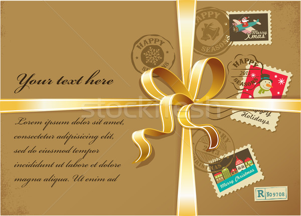 Christmas gift with gold ribbon and vintage postage stamps Stock photo © marish