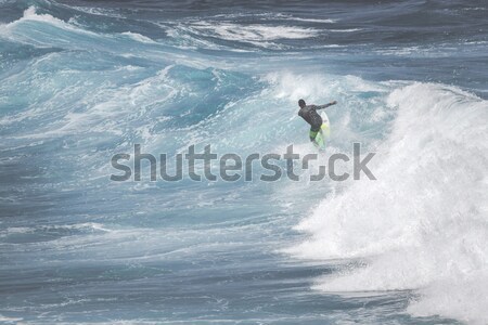 Extreme surfer riding giant ocean wave in Hawaii Stock photo © Mariusz_Prusaczyk