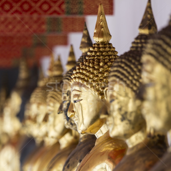 Images of Buddha at Wat Pho or Wat Phra Chetupon Vimolmangklarar Stock photo © Mariusz_Prusaczyk