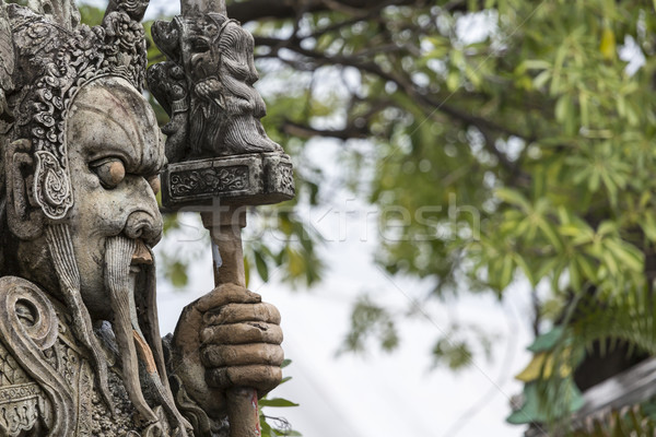 Statue of a Chinese warrior near an entrance of Wat Pho. Wat Pho Stock photo © Mariusz_Prusaczyk