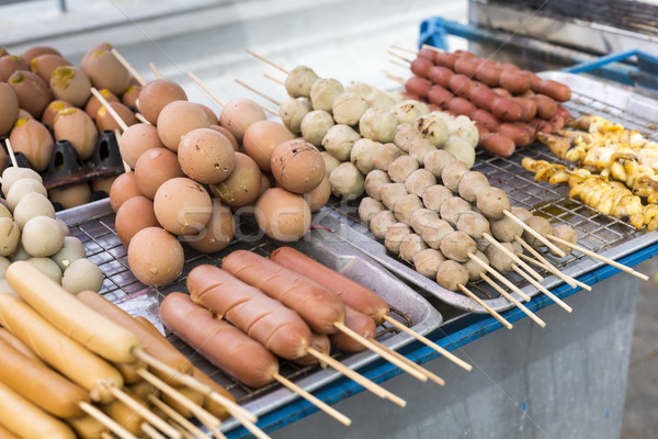 Stock photo: Grilled Thai sausages on the stove in the boat at Traditional Ma