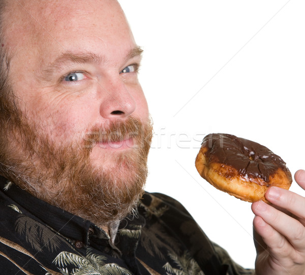 Férfi csokoládé fánk középkorú elhízott eszik Stock fotó © markhayes