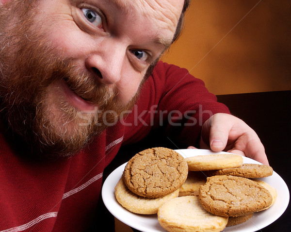 Man cookie te zwaar cookies home Stockfoto © markhayes