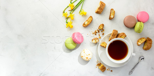 Tea with cookies,  macaroons and flowers. Flat lay. Stock photo © markova64el