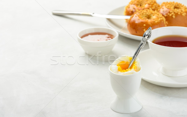 Breakfast of boiled egg and brioche buns Stock photo © markova64el