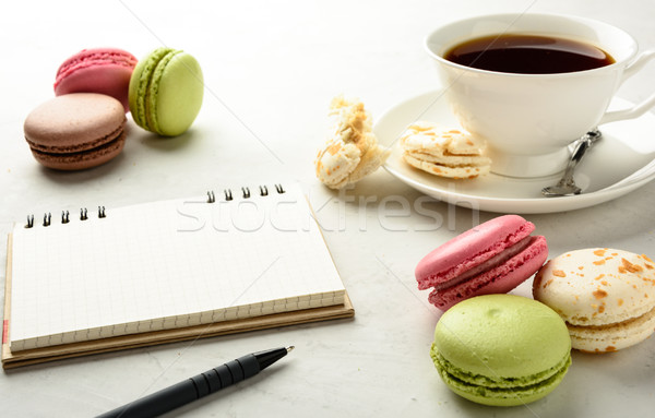 Cup tè notebook nero gustoso bianco Foto d'archivio © markova64el