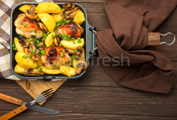 Dinner with baked chicken legs and vegetable.  Stock photo © markova64el