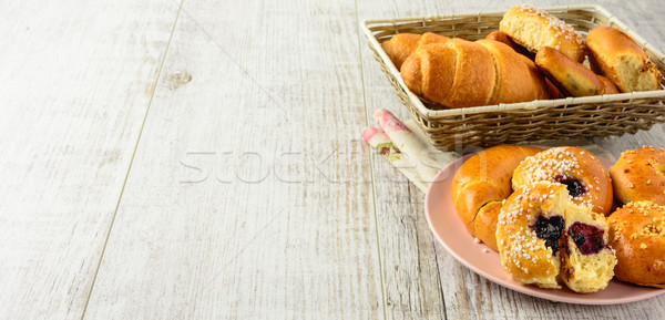 Healthy breakfast ingredients on a white wooden table. Stock photo © markova64el