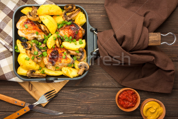 Dinner with baked chicken legs and vegetable.  Stock photo © markova64el