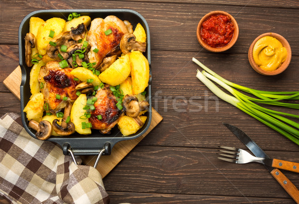 Dinner with baked chicken legs and vegetable.  Stock photo © markova64el