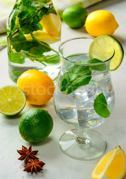 lemonade in a glass on a white background. Stock photo © markova64el