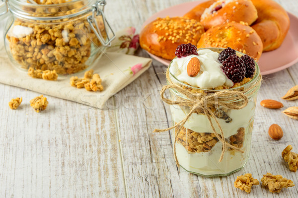 Healthy breakfast ingredients on a white wooden table. Stock photo © markova64el