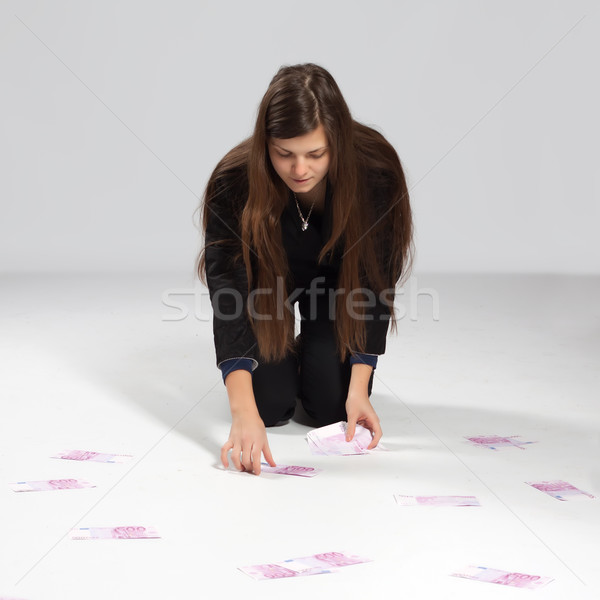Young long-haired woman and money Stock photo © maros_b