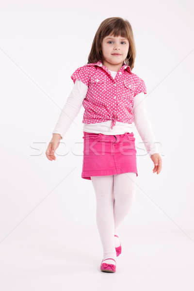 Little girl pré-escolar modelo rosa saia sandálias Foto stock © maros_b