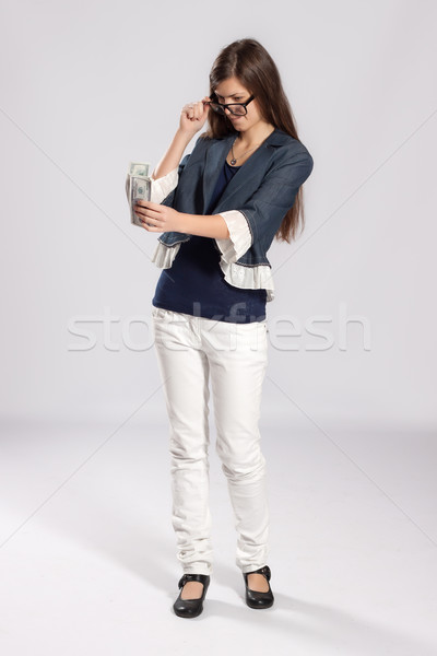 молодые женщину деньги очки стороны бумаги Сток-фото © maros_b