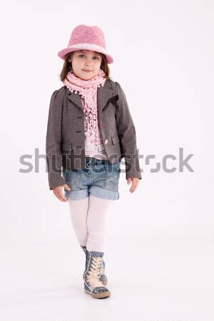 Küçük kız okul öncesi model pembe şapka kat Stok fotoğraf © maros_b