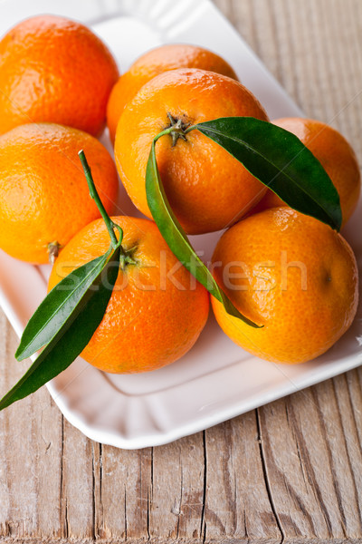 Bladeren plaat houten tafel voedsel natuur blad Stockfoto © marylooo