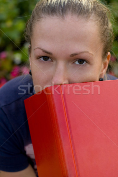 woman with red book Stock photo © marylooo