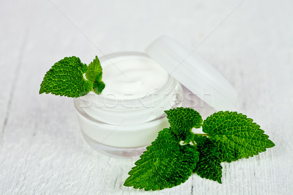 Crema per il viso vetro jar foglia verde bianco legno Foto d'archivio © marylooo