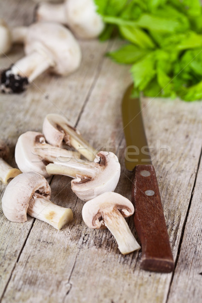  fresh sliced champignons with parsley and old knife Stock photo © marylooo