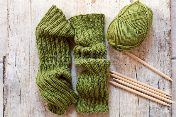 wool green legwarmers, knitting needles and yarn Stock photo © marylooo