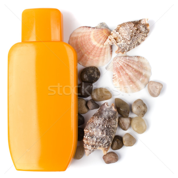 Lotion Kiesel Muscheln weiß Sonne Hintergrund Stock foto © marylooo