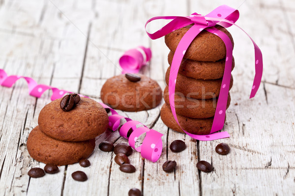 stack of chocolate cookies tied with pink ribbon and coffee bean Stock photo © marylooo