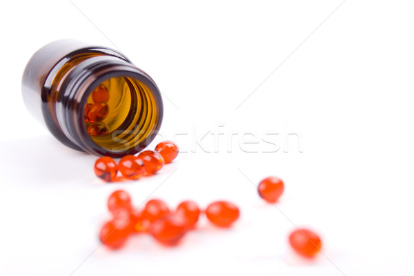 bottle with red pills Stock photo © marylooo