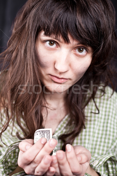 Genç kadın para kız el evsiz kişi Stok fotoğraf © marylooo