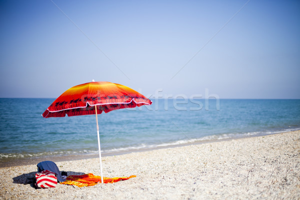 Umbrella on tropical beach Stock photo © marylooo