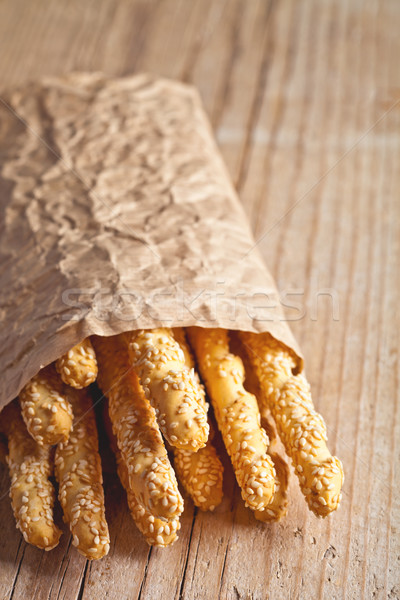 bread sticks grissini with sesame seeds in craft pack Stock photo © marylooo