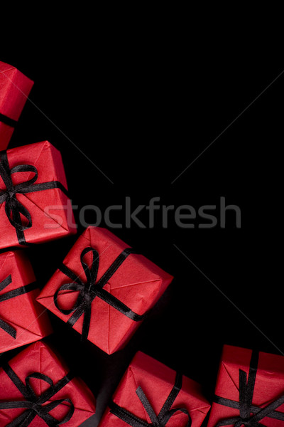 red gift boxes on black Stock photo © marylooo