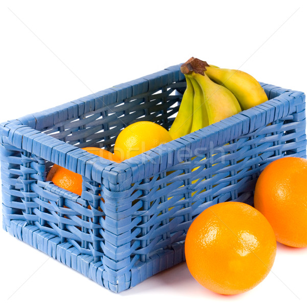 blue basket with fruits Stock photo © marylooo