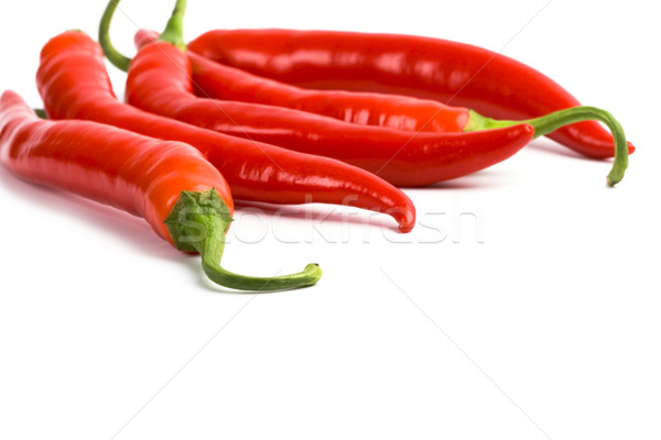 five red chilli peppers Stock photo © marylooo