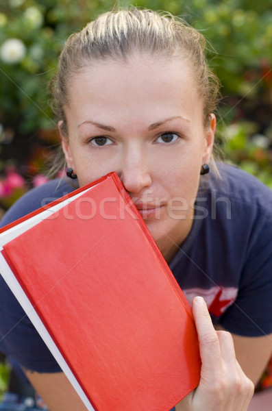 woman with red book Stock photo © marylooo