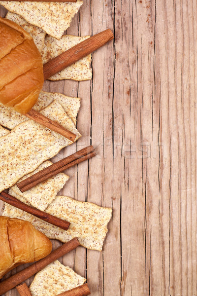 crackers, cinnamon sticks and fresh croissants Stock photo © marylooo