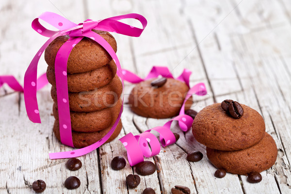 Boglya csokoládé sütik rózsaszín szalag kávébab kávé Stock fotó © marylooo