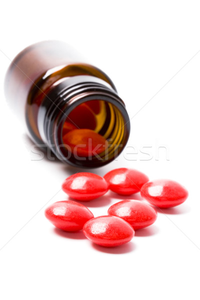 glass bottle with red pills Stock photo © marylooo