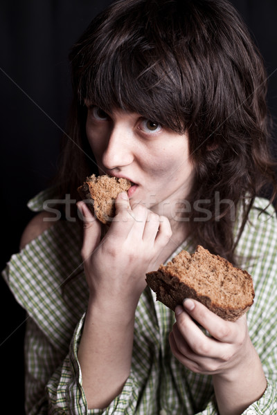 [[stock_photo]]: Mendiant · femme · manger · pain · portrait · pauvres