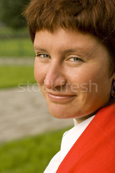 Stock photo: redhead woman in red