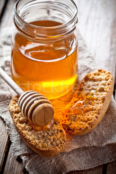 crackers and honey Stock photo © marylooo