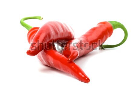 Trzy czerwony chłodny papryka biały żywności Zdjęcia stock © marylooo