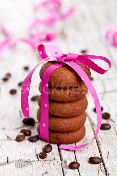 Boglya csokoládé sütik rózsaszín szalag kávébab kávé Stock fotó © marylooo