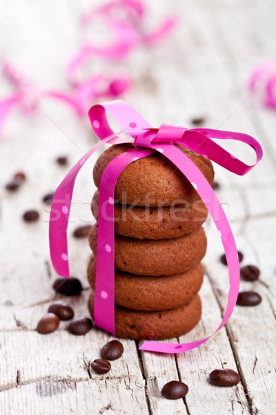 stack of chocolate cookies tied with pink ribbon and coffee bean Stock photo © marylooo