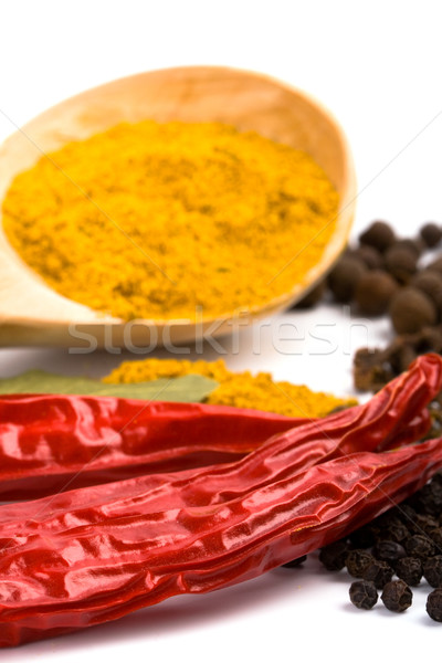 Fűszer curry fakanál paprikák szegfűszeg levelek Stock fotó © marylooo