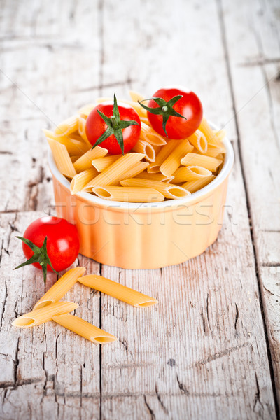 Macarrão tomates cereja tigela rústico comida Foto stock © marylooo